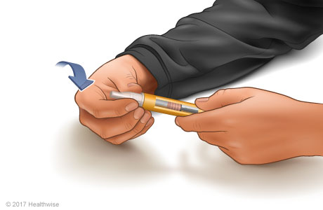 Putting a new needle in an insulin pen